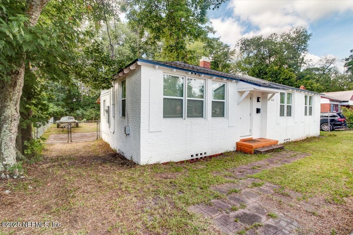 4636 TIMUQUANA Road, Jacksonville, FL 32210 2