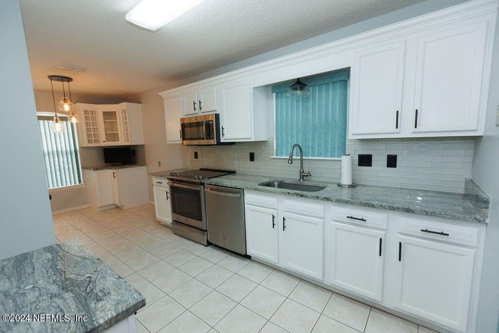 3141 PADDLE BOAT Lane, Jacksonville, FL 32223 3