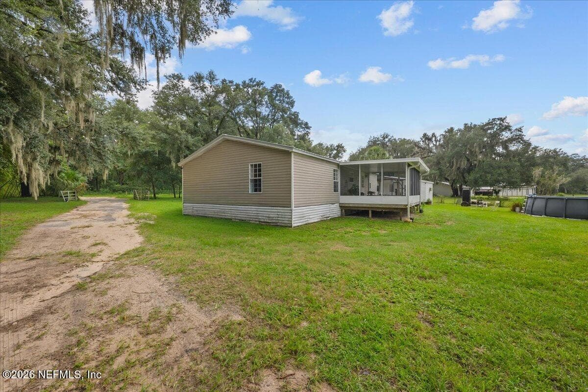 703 WALKER Drive, Interlachen, FL 32148, Interlachen, FL - photo 2